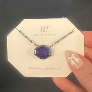 “Laced with Distant Fire”
Lab created amethyst fused with genuine quartz